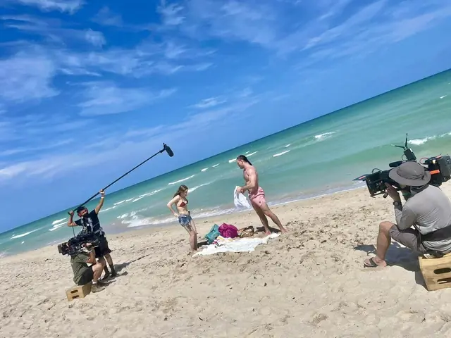Max Rivera recording sound on a Miami beach