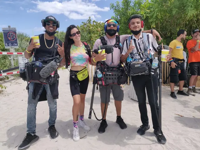 Max Rivera with a four-person reality crew on location in South Florida