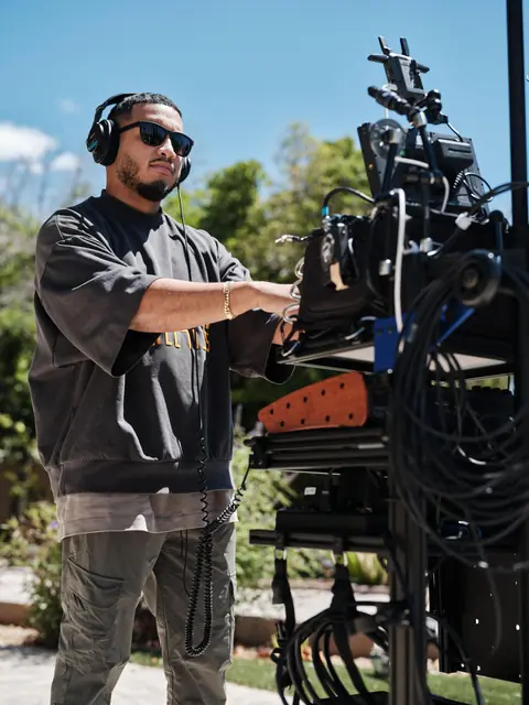 Cesar Conde at his sound cart on a Miami exterior